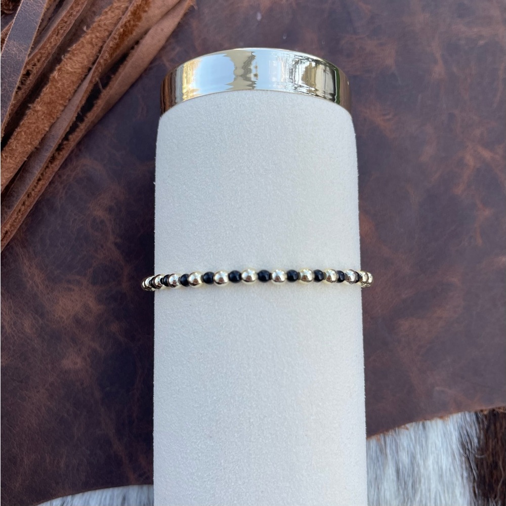 Black and 14kt gold filled beaded bracelet